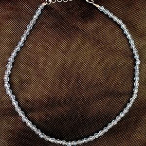 Brand new light blue artificial crystal necklace.